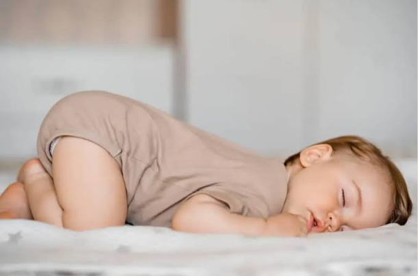 baby sleeping with butt in the air